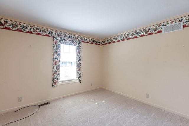 unfurnished room featuring carpet