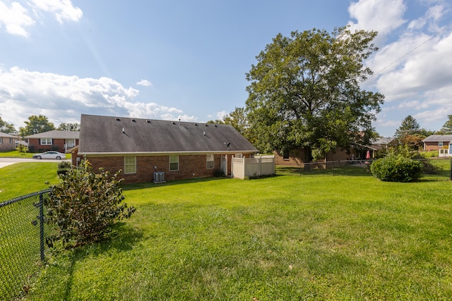 view of yard featuring central AC unit