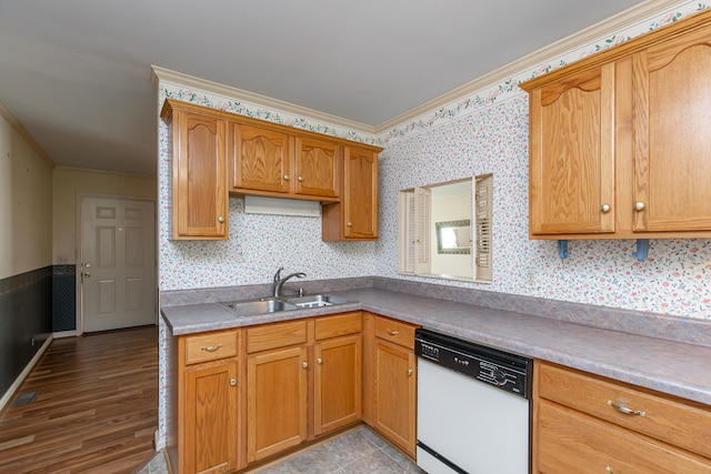 kitchen featuring ornamental molding, sink, white dishwasher, and light hardwood / wood-style flooring