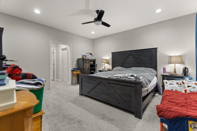 bedroom with light colored carpet and ceiling fan