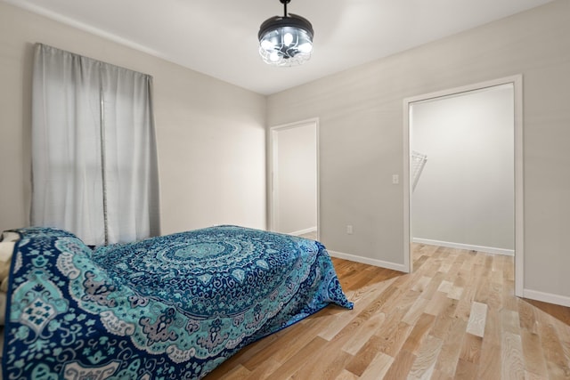 bedroom featuring wood-type flooring