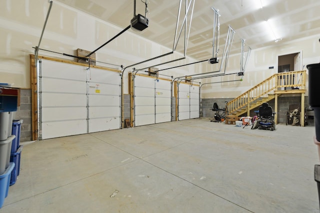 garage featuring a garage door opener