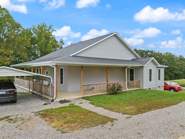 farmhouse inspired home with a carport and covered porch