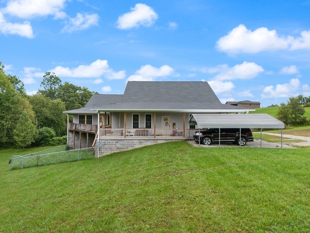 back of property featuring a porch, a yard, and a carport