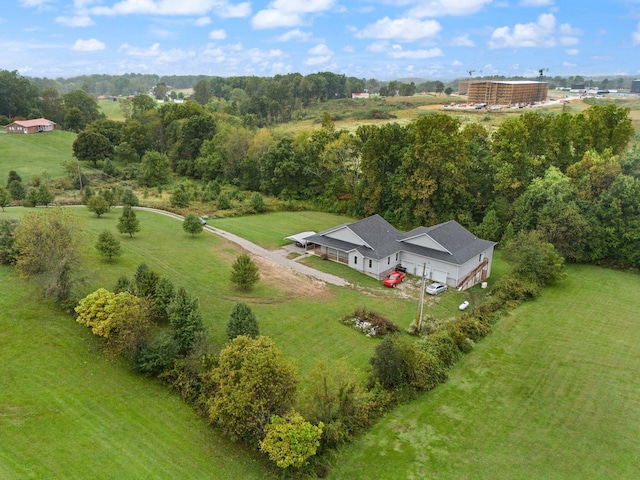 birds eye view of property featuring a rural view