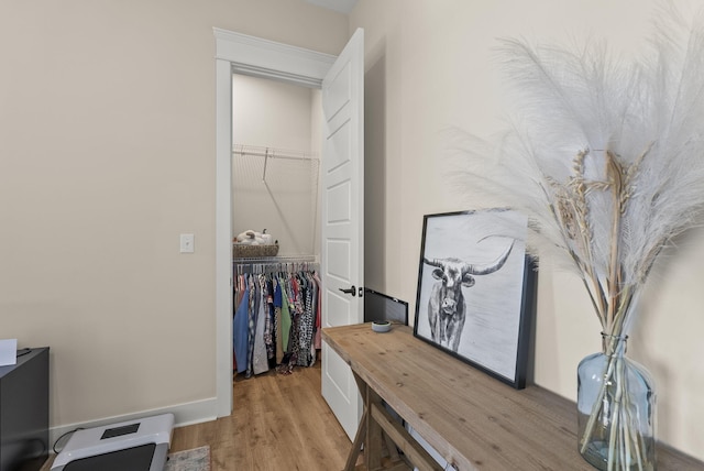 office space with light wood-type flooring