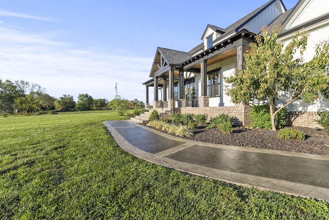 view of home's exterior featuring a lawn