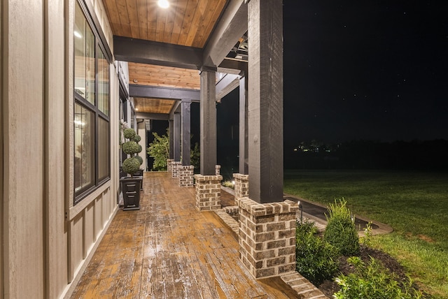 patio at night with a lawn