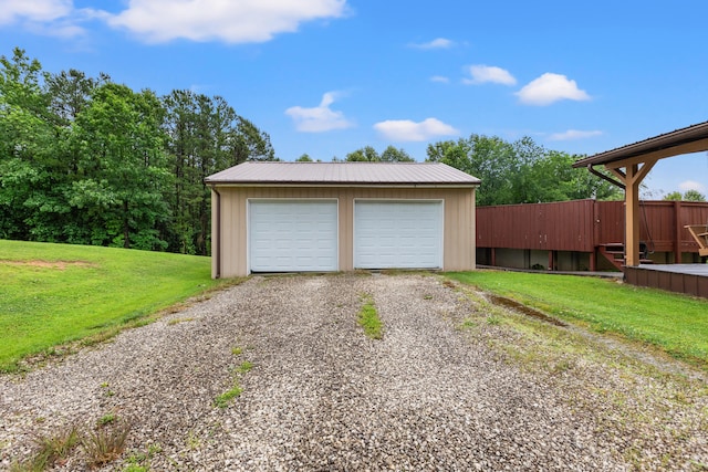 garage with a yard