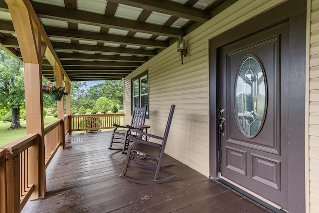 doorway to property with covered porch