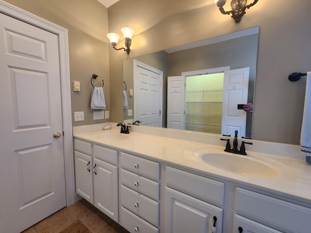 bathroom with vanity and tile patterned floors