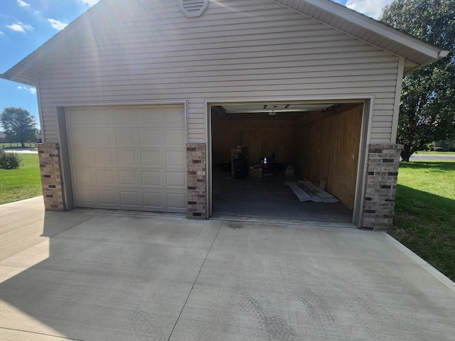 garage featuring wood walls