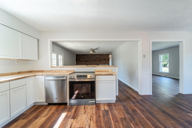 kitchen with white cabinets and dark wood-type flooring