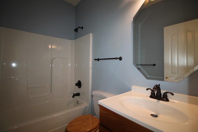 full bathroom with vanity, bathing tub / shower combination, and toilet