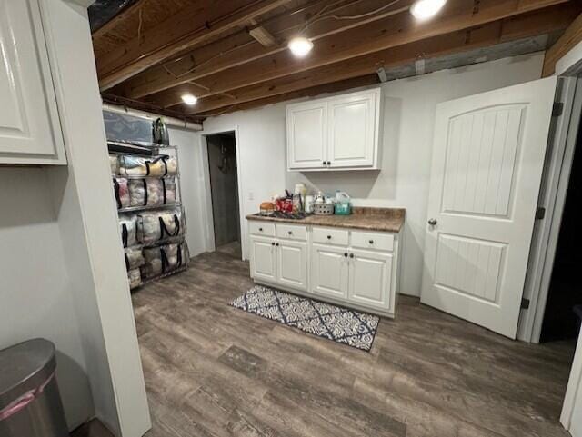 bar featuring dark wood-style floors