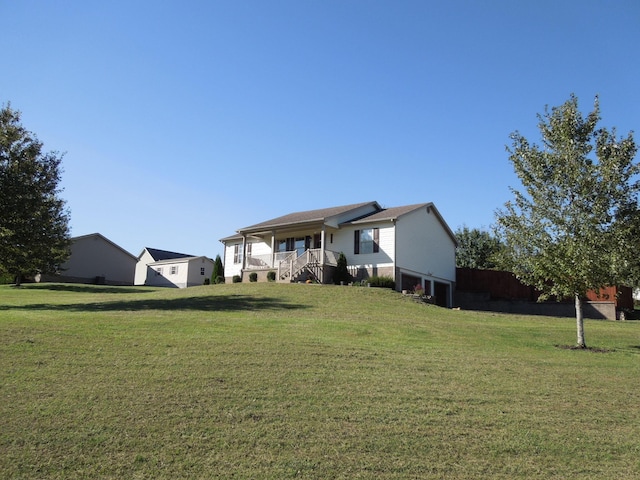 exterior space featuring a yard and a porch