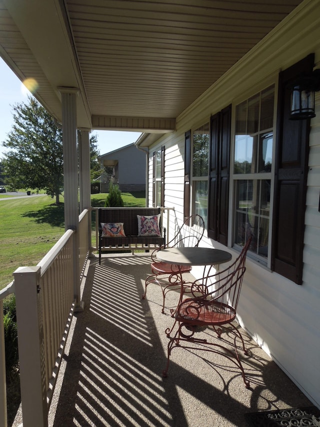 wooden terrace with covered porch