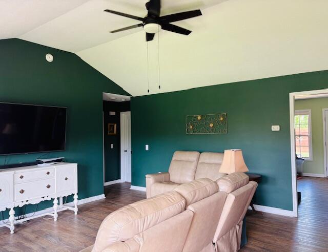 222 Elm Loop, Hustonville, KY 40437 - living area with a ceiling fan, vaulted ceiling, wood finished floors, and baseboards
