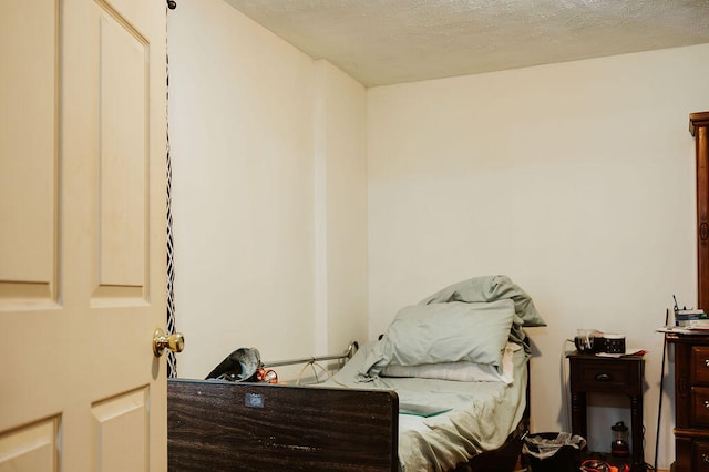 bedroom with a textured ceiling