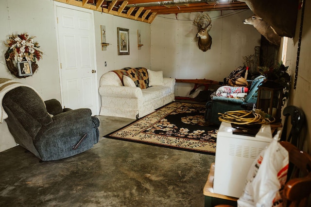 living room featuring concrete flooring