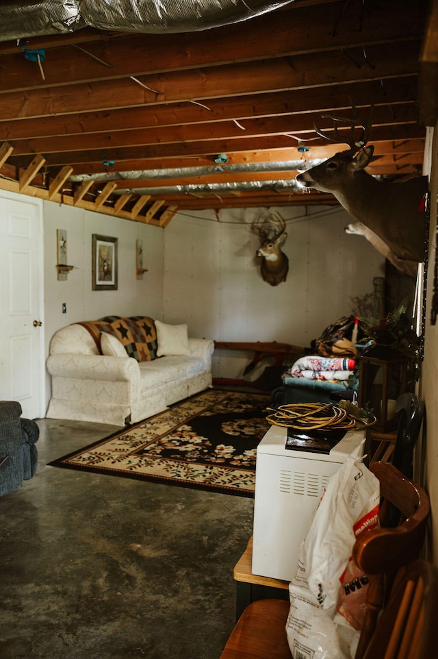 living room featuring concrete floors