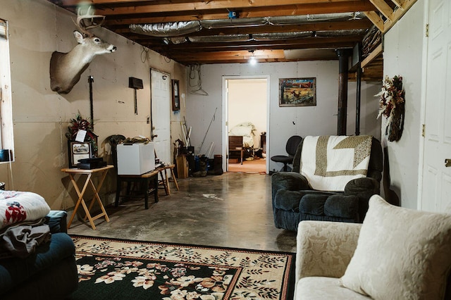 living room featuring concrete flooring