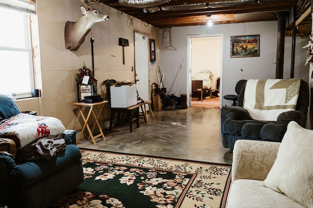 living room with concrete flooring