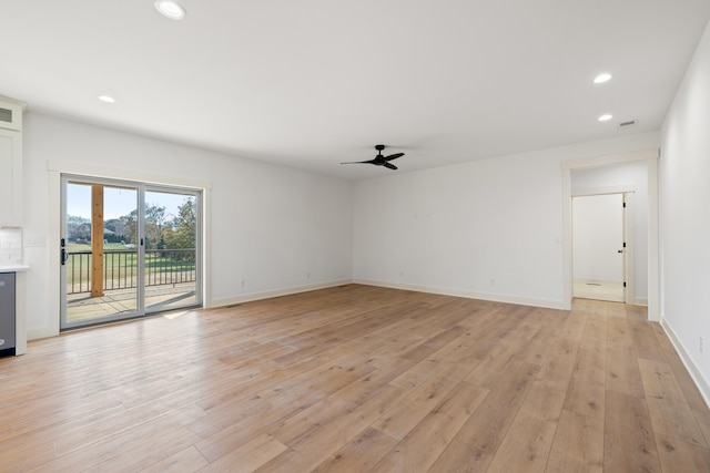 unfurnished living room with light hardwood / wood-style floors and ceiling fan