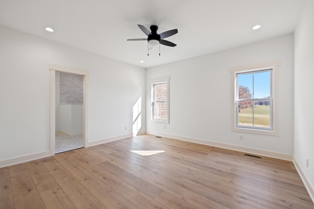 unfurnished bedroom featuring light hardwood / wood-style floors and ceiling fan