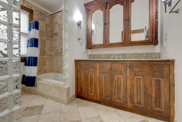 bathroom with shower / bath combo and vanity