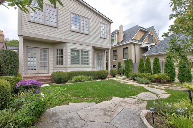 view of front of home with a front yard