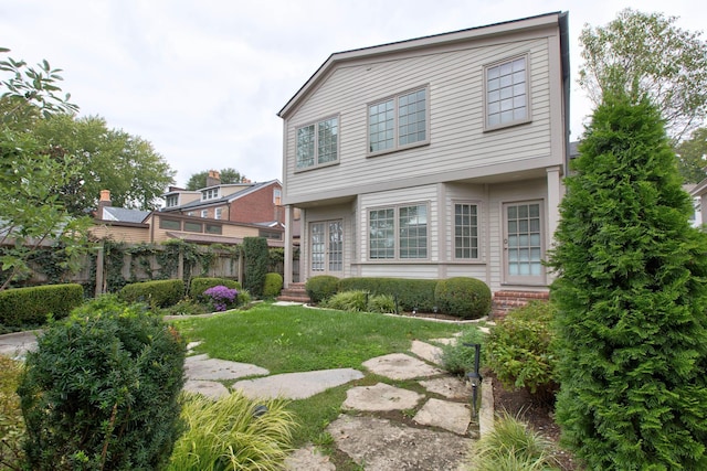 view of front facade with a front lawn