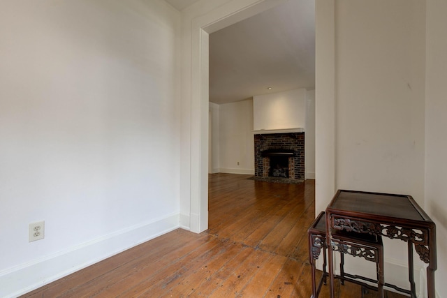 hallway featuring hardwood / wood-style flooring