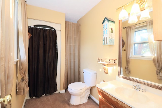 bathroom with a notable chandelier, vanity, toilet, and a shower with curtain