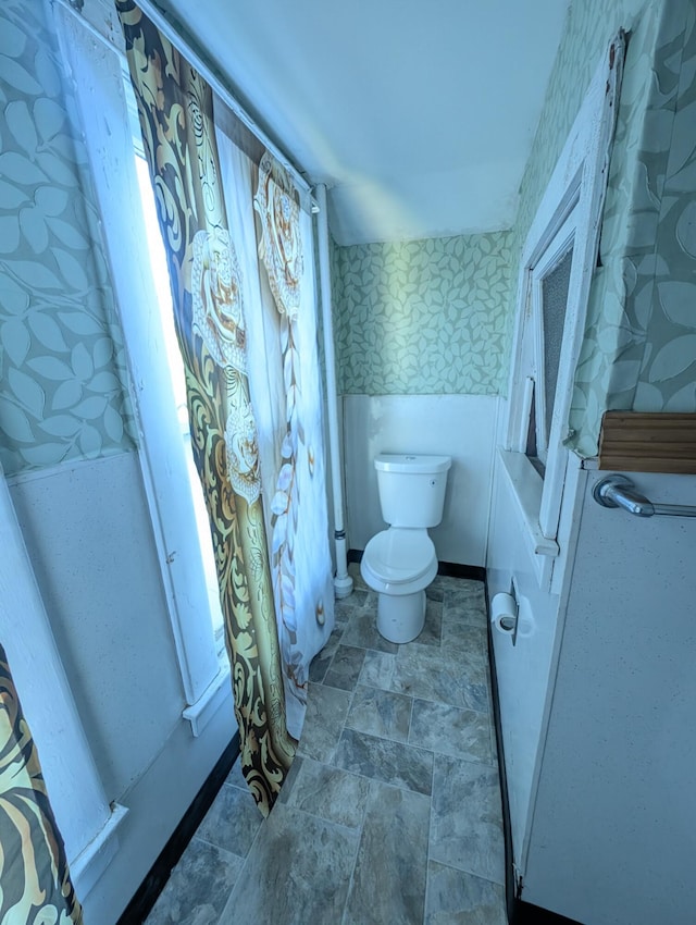 bathroom featuring toilet