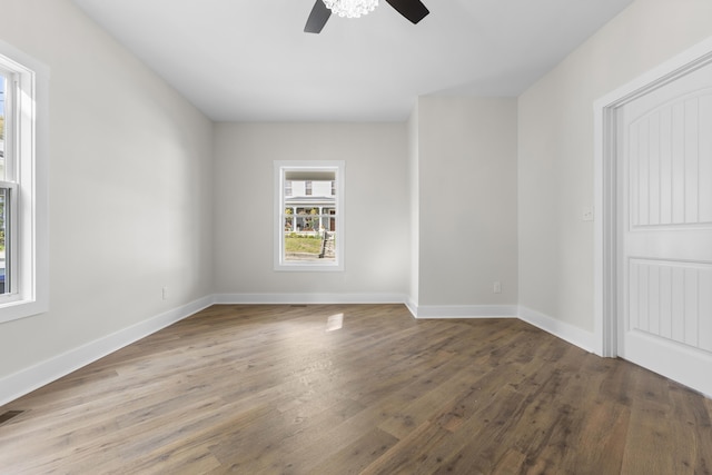 323 Conway St, Frankfort, KY 40601 - empty room with wood finished floors, visible vents, baseboards, and ceiling fan
