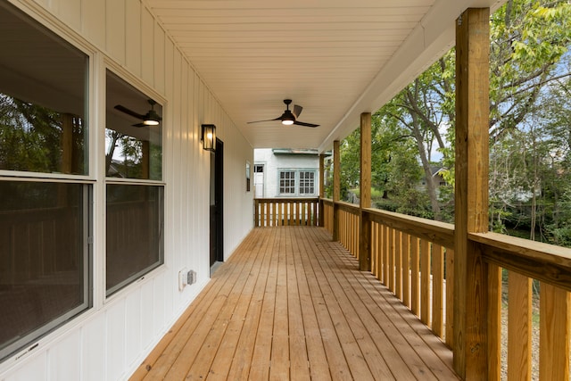 wooden deck featuring ceiling fan