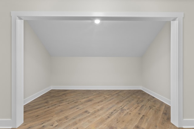 323 Conway St, Frankfort, KY 40601 - bonus room with vaulted ceiling, baseboards, and wood finished floors
