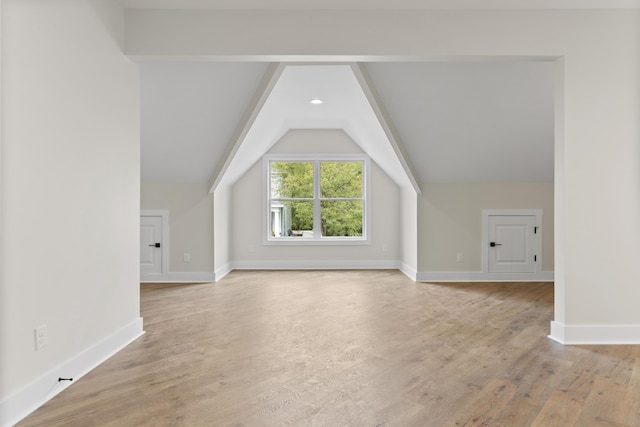 323 Conway St, Frankfort, KY 40601 - additional living space featuring recessed lighting, baseboards, lofted ceiling, and light wood-type flooring
