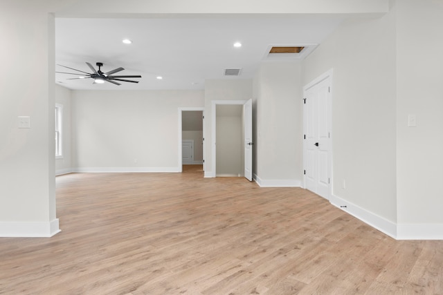 spare room with light hardwood / wood-style floors and ceiling fan