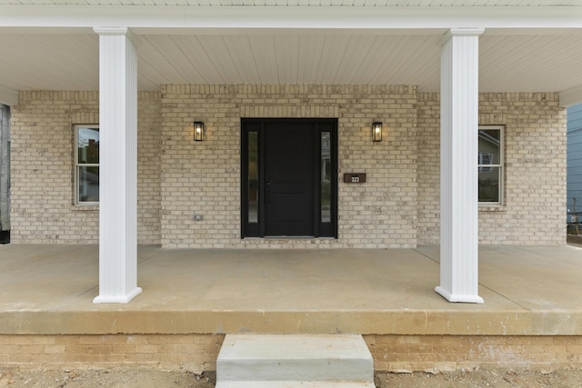 323 Conway St, Frankfort, KY 40601 - entrance to property featuring brick siding and a porch