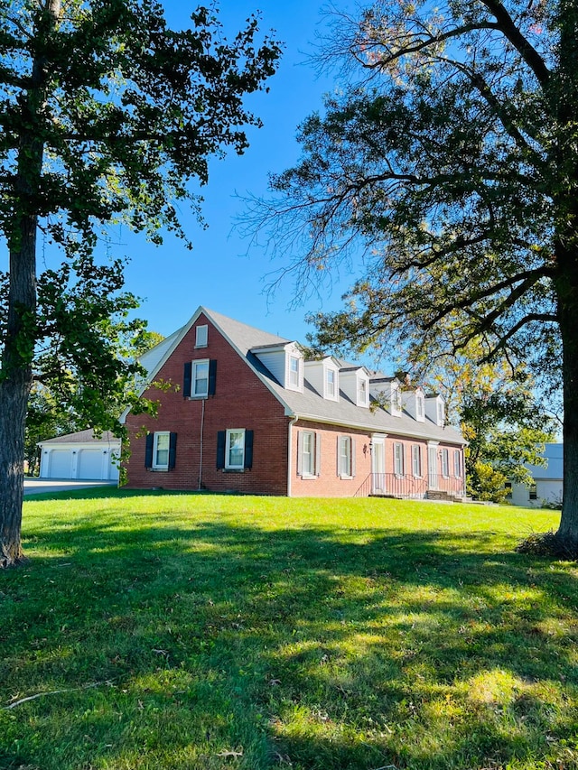 view of property exterior with a yard and a garage