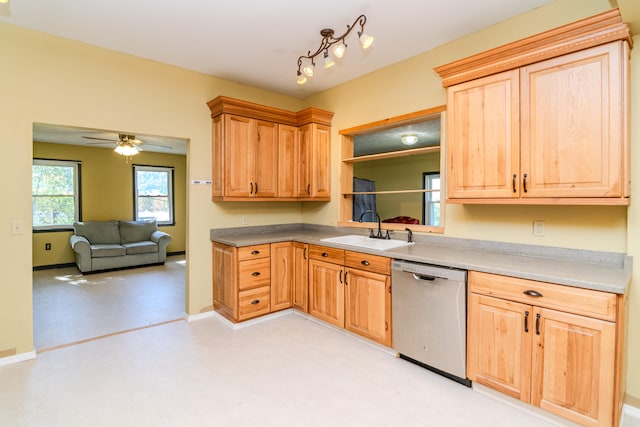 kitchen featuring sink, ceiling fan, and stainless steel dishwasher