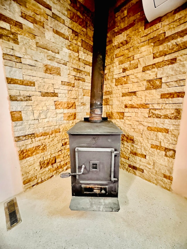 interior details featuring a wood stove