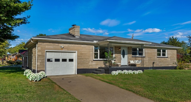 ranch-style home with a front yard and a garage