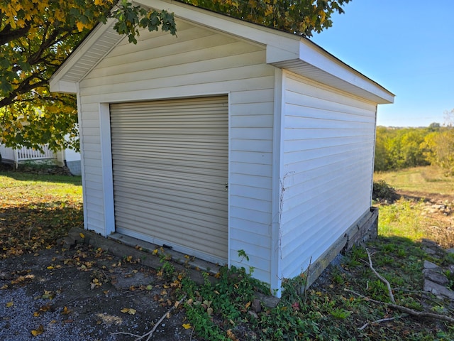 view of outbuilding with a garage