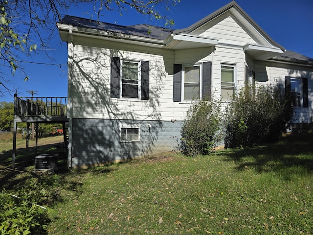 595 Bethel Ridge Rd, Sharpsburg, KY 40374 - view of side of property with a lawn, a deck, and central air condition unit