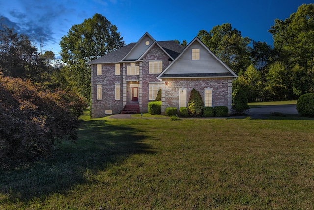 craftsman-style home featuring a front yard