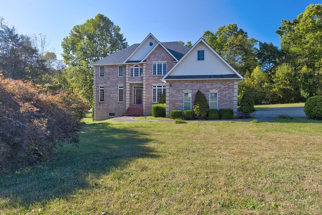 view of front facade featuring a front yard