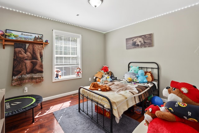 bedroom with wood-type flooring